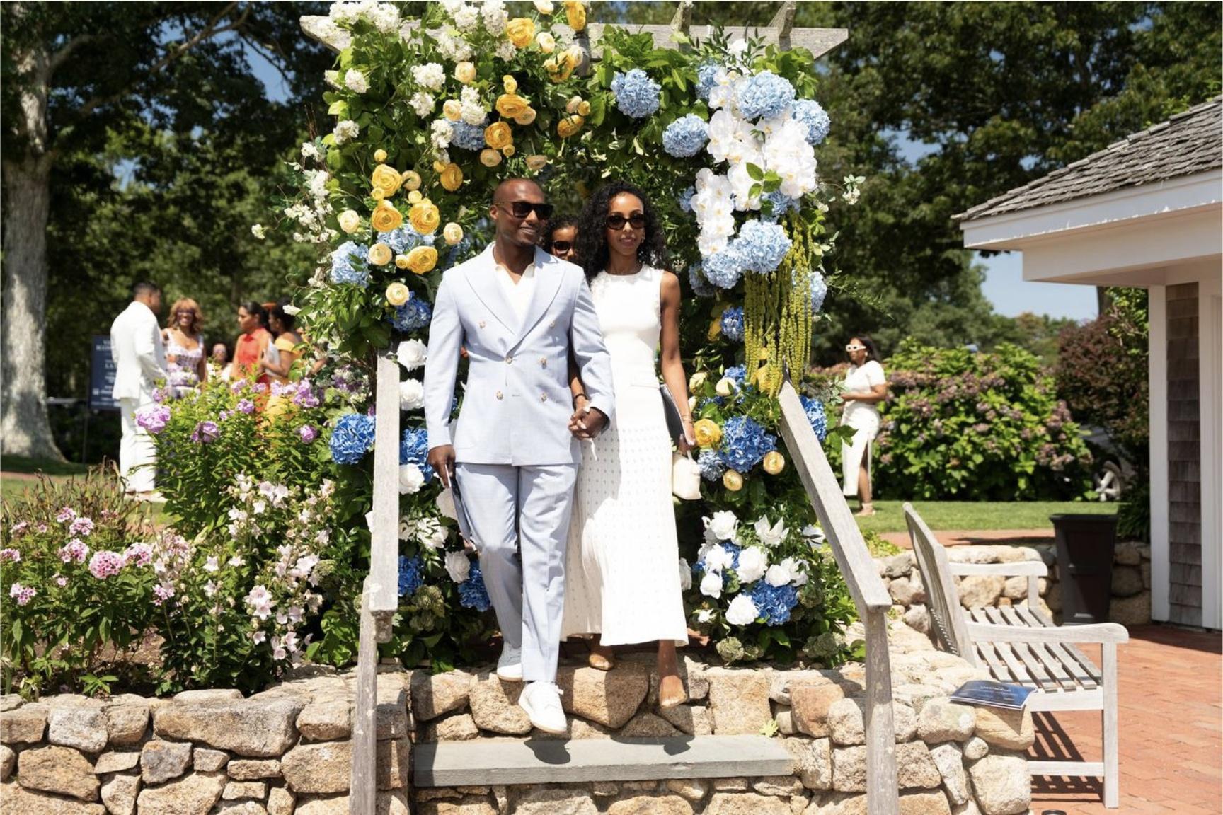 Guests arriving through floral arch at the Vineyard Icon Awards