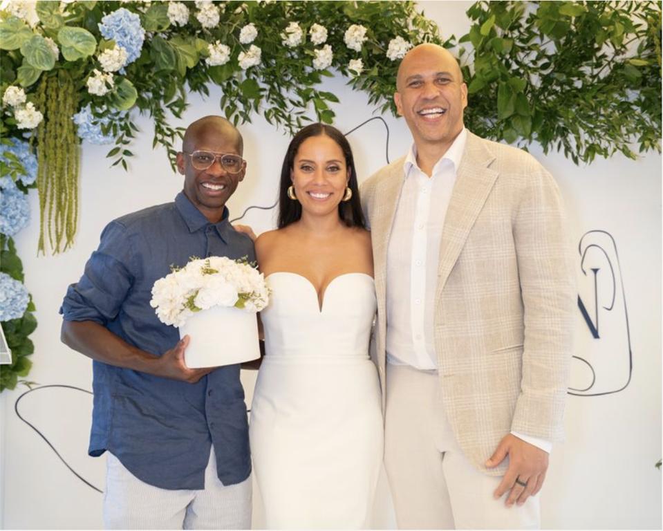 Troy Carter, Erin Goldson, and Senator Cory Booker
